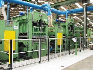 Central section of the flattening line 2,000 x 20 mm, view of flattening machines and tandem brushing machines.